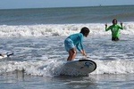 Surf lesson & Beach day in Playa Caracol