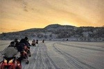 Snowmobile Safari Along the River Valley