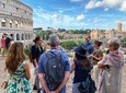 The Colosseum and Forum with an Archaeologist