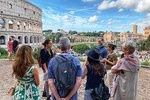 The Colosseum and Forum with an Archaeologist