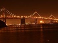 Experience San Francisco at Night in a Luxury SUV with a glass of champagne