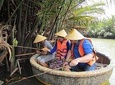 Hoi An Basket Boat Tour ( basket boat, visit water coconut forest, fishing crab)