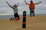 Sandboarding ( sandsurfing ) with lunch in berber house