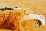 Evening Desert Safari with Quad Bike Experience, BBQ Dinner & Live Shows