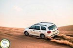 Exclusive Sunrise Desert Safari with Camel Ride Sand Boarding Dune Bashing
