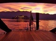 A private romantic sunset cruise on Lake Orta, sipping wine on board