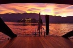 A private romantic sunset cruise on Lake Orta, sipping wine on board