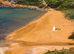 Relax on Red Sandy Beach (Ramla Bay), Gozo Island, Malta