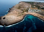 Swim at Spiaggia del Corallo, Mellieħa, Malta