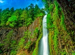 Walk through Tunnel Falls, Oregon