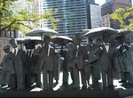 See Tiny Happy Man's Statues, Chicago, Illinois
