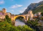 Walk across Stari Most Bridge (Old Stone Bridge), Mostar, Bosnia and Herzegovina