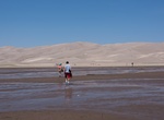 Relax in Medano Creek, Great Sand Dunes National Park, Colorado